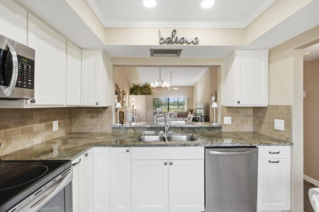 Photo of 9430 Meadowood Drive #205, Fort Pierce, FL 34951 (MLS # R11140356)