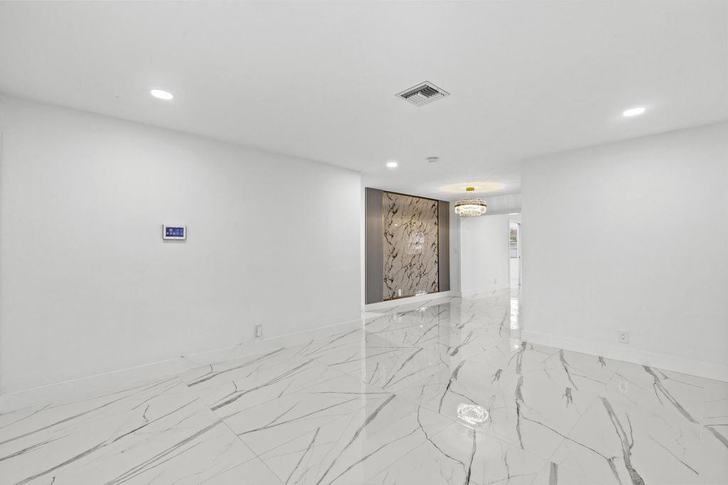 Photo of 1651 W 35th Street, Riviera Beach, FL 33404 (MLS # R11125519)