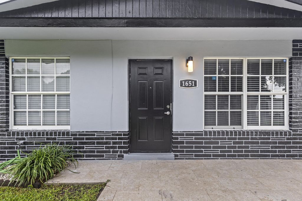 Photo of 1651 W 35th Street, Riviera Beach, FL 33404 (MLS # R11125519)
