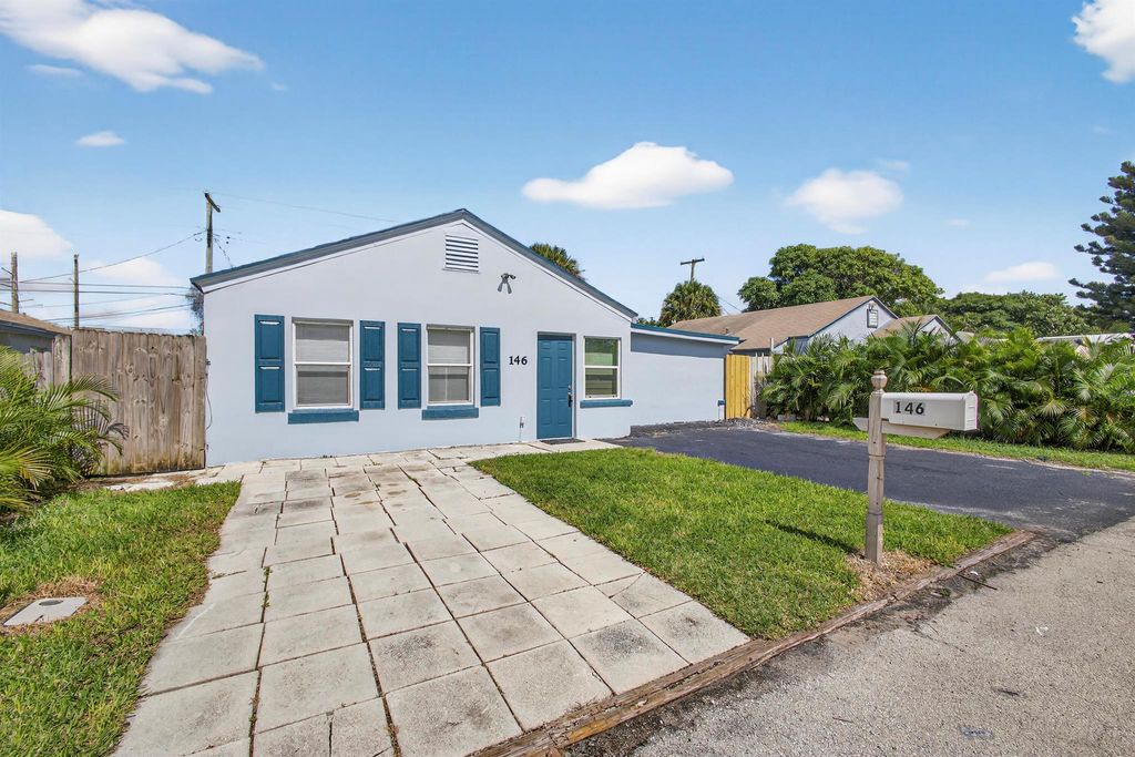Photo of 146 W 18th Street, Riviera Beach, FL 33404 (MLS # R11134101)