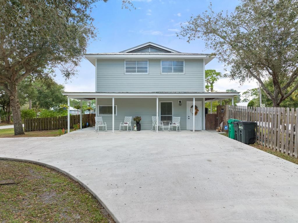 Photo of 8670 Jay Gardens Lane, Fort Pierce, FL 34945 (MLS # R10936388)