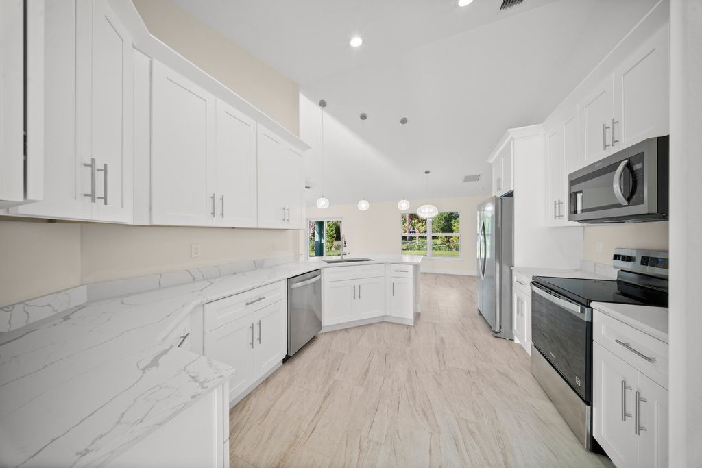 Photo of 5711 Myrtle Drive, Fort Pierce, FL 34982 (MLS # R11131823)