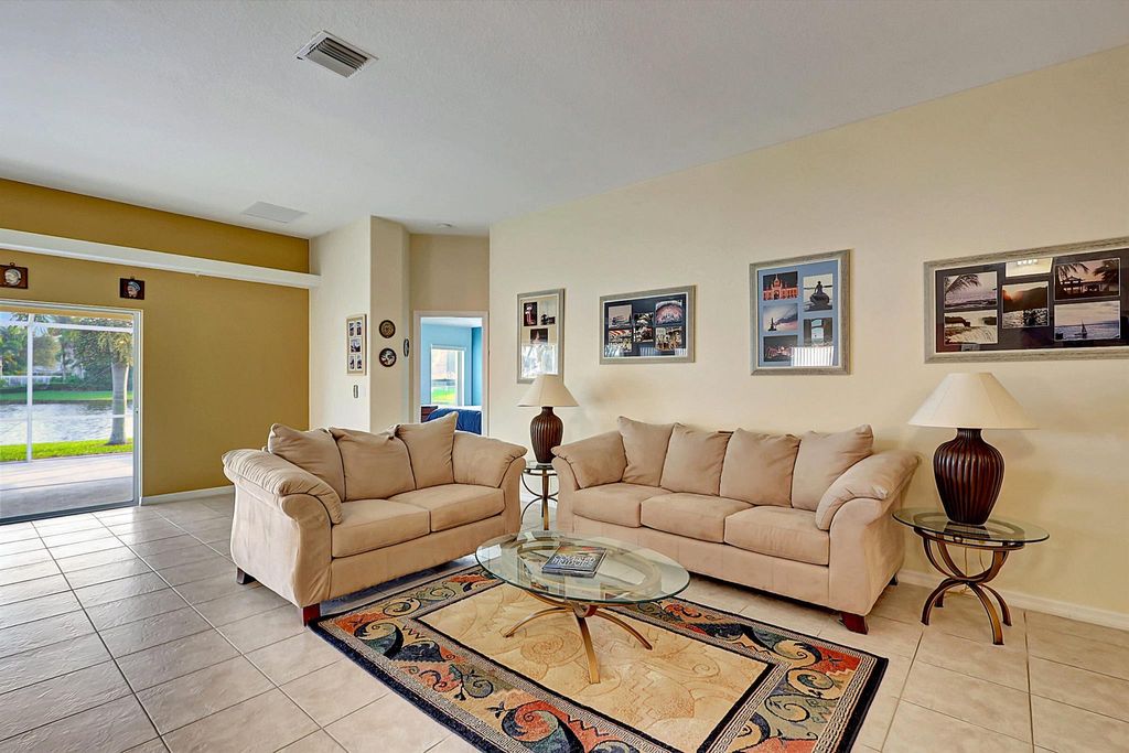 Photo of 524 SW Cyrilla Trail, Port Saint Lucie, FL 34953 (MLS # R10940036)