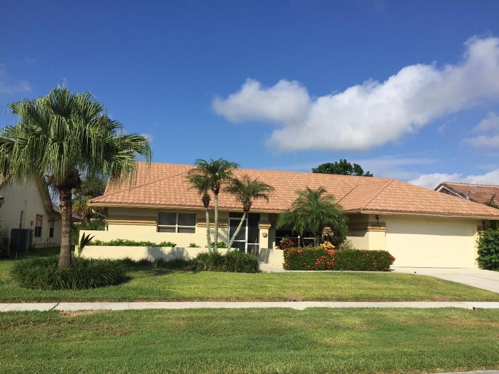 Photo of 9775 Sun Pointe Drive, Boynton Beach, FL 33437 (MLS # R11133497)
