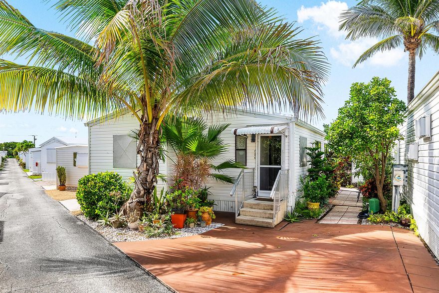 39 SHARES. Just four units from the sand, this fully furnished double-wide offers the perfect coastal retreat in the heart of Briny Breezes. With a spacious and open layout, this 1-bedroom, 1.5-bath home provides ample room for both relaxing and entertaining. The large living areas flow seamlessly, giving you the feel of a much larger space, while the bedroom suite offers privacy and comfort. Driveway directly outside unit. Enjoy the ease of a move-in-ready home complete with tasteful furnishings, abundant natural light, and the rare convenience of extra square footage. Whether you're looking for a seasonal getaway or a full-time residence, this beachside gem combines charm, comfort, and location--all just steps from the ocean.
