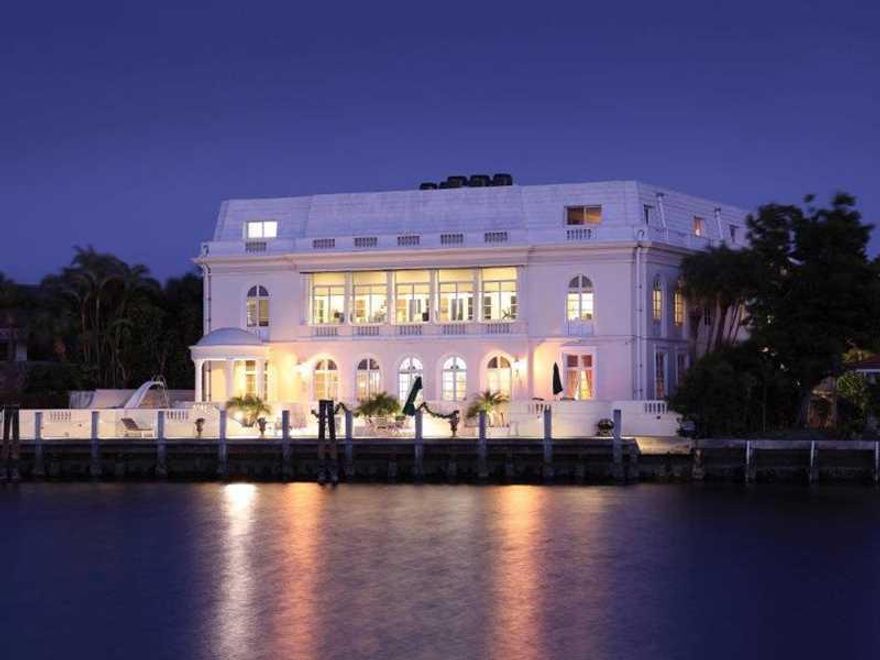 Palm Beach Regency Style Inspired New to the Market Gem. Located in Sea Ranch Lakes - prestigious guard gated enclave with 121' of prime intracoastal waterway. Private beach access with clubhouse and pool. A one of a kind custom palatial estate boasts a g rand foyer entry with a butterfly staircase, 6 en suite bedrooms, custom built office, cabana bath, and additional rooms for exercise and au pair. Call for a private showing.