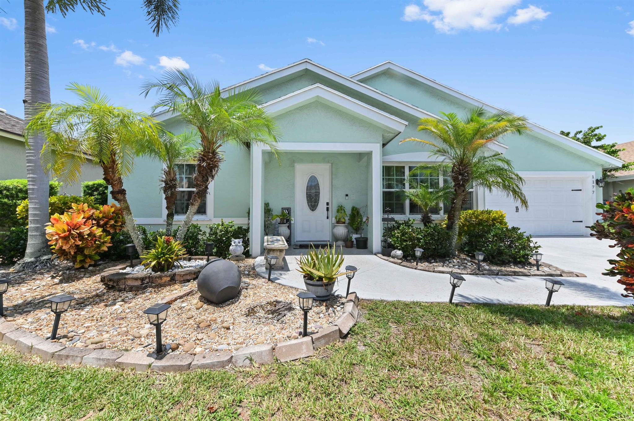 Prepare to be captivated by this stunning, move-in-ready home, ideally situated within a secure, family-friendly, and well-maintained gated community. Boasting three spacious bedrooms and two bathrooms, this residence offers a perfect blend of comfort and contemporary style. Step inside to discover a bright and airy living room, enhanced by a cathedral ceiling. The thoughtful split-bedroom design ensures privacy and tranquility, while the combined kitchen and family room create a central hub for daily living and entertaining, making it easy to stay connected with loved ones.