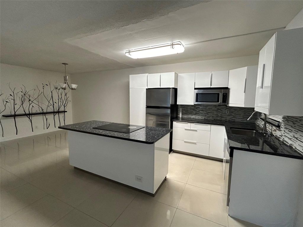 Photo of 1301 NW 12th Avenue #316 A, Boca Raton, FL 33486 (MLS # F10488723)