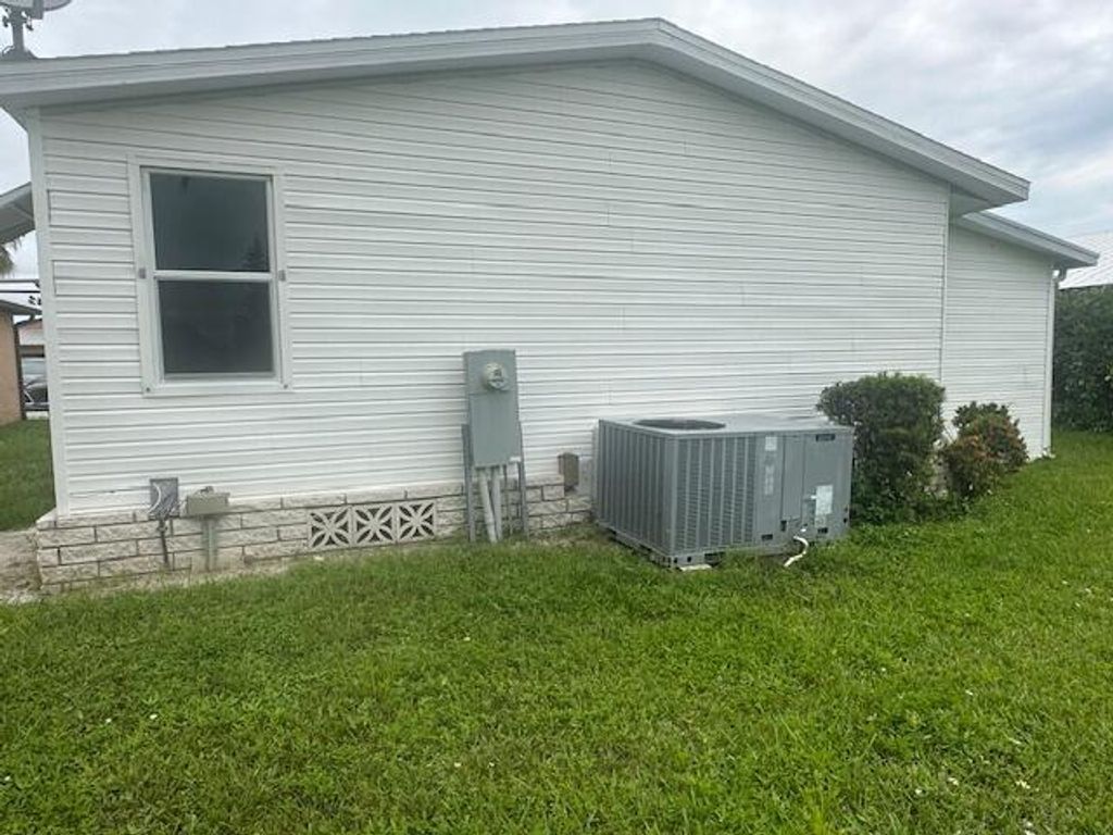 Photo of 6685 Lila Ct. Court, Fort Pierce, FL 34951 (MLS # R11124836)