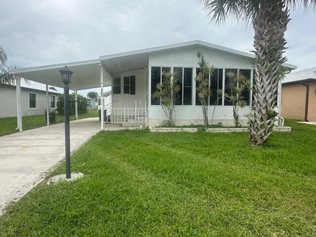 Photo of 6685 Lila Ct. Court, Fort Pierce, FL 34951 (MLS # R11124836)