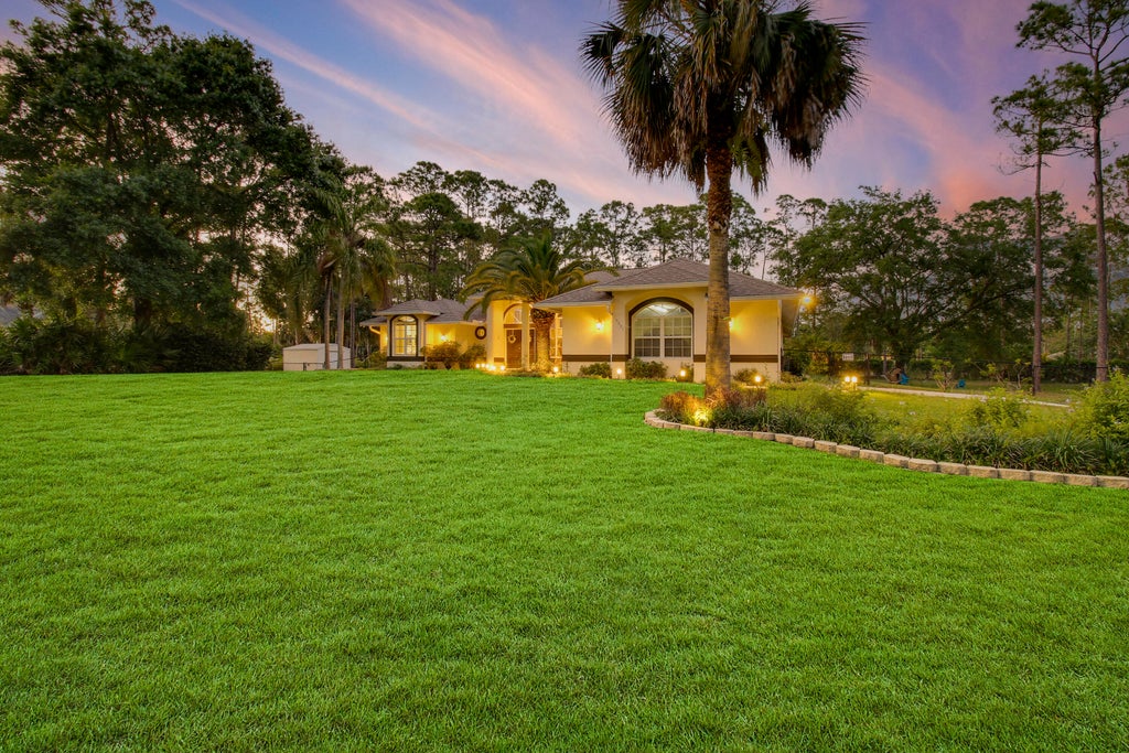Photo of 15591 N 75th Lane N, The Acreage, FL 33470 (MLS # R10976356)