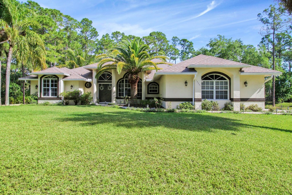 Photo of 15591 N 75th Lane N, The Acreage, FL 33470 (MLS # R10976356)