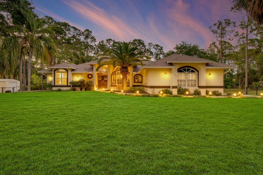 Photo of 15591 N 75th Lane N, The Acreage, FL 33470 (MLS # R10976356)
