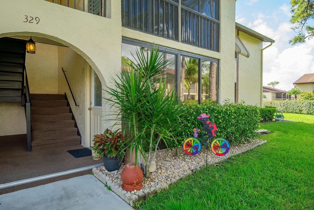 Photo of 329 Knotty Pine Circle #D-1, Greenacres, FL 33463 (MLS # R11135902)