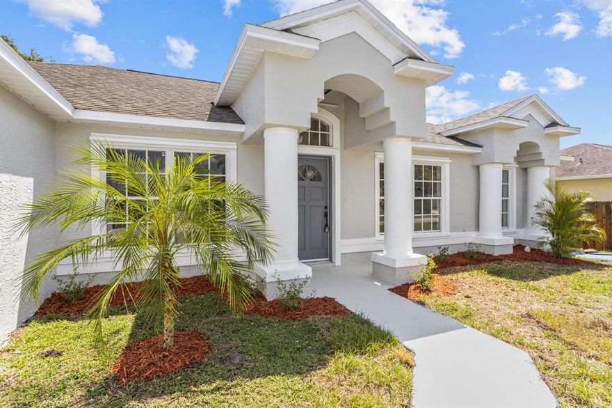 This renovated home is truly a gem! With its open floor plan and beautiful layout, it offers a modern and stylish living space. The property boasts four bedrooms and two full baths, providing ample room for a family or guests. The kitchen and bathrooms feature beautiful quartz countertops, adding elegance and durability to these important spaces. The kitchen cabinets are equipped with soft-close doors and drawers, providing convenience and a touch of luxury. The home also offers high ceilings, Two natural skylights. Giving natural light throughout main living area, creating a spacious and airy atmosphere. With a brand-new roof, and two impact resistant skylights, you can enjoy peace of mind and worry-free living. The property features plenty of fruit trees and shades, allowing you to have quiet and peaceful moments with nature. Additionally, there is plenty of room for a pool if desired. Located in a great neighborhood, this home is conveniently close to I-95, Florida Turnpike, Tradition, hospitals, shopping centers, entertainment options, and excellent schools. The absence of an HOA means you have more flexibility and freedom in how you use and maintain your property. Make sure to see this home before it's gone!