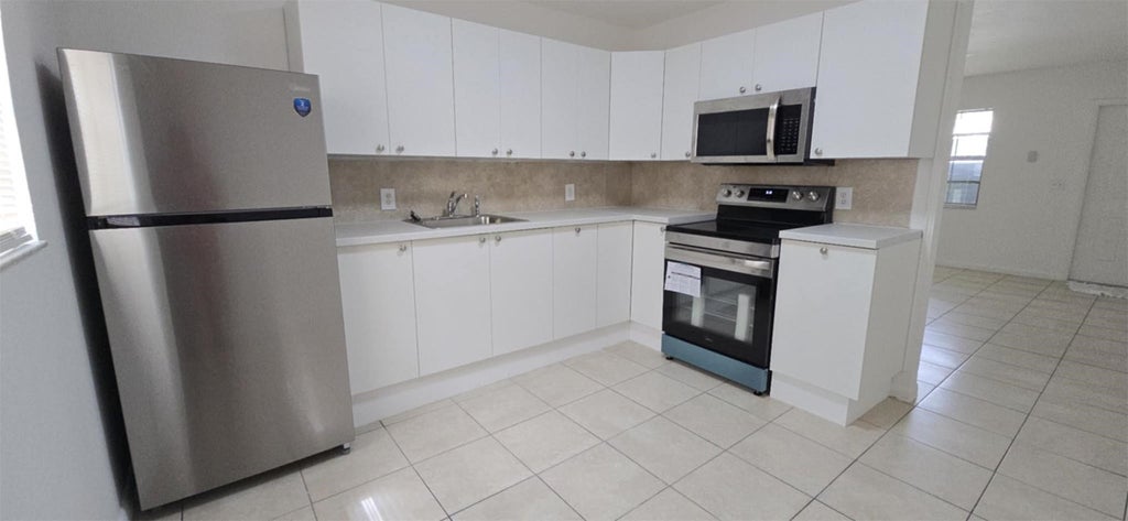 Photo of 255 SW 12th Street #2, Dania Beach, FL 33004 (MLS # B26051587)