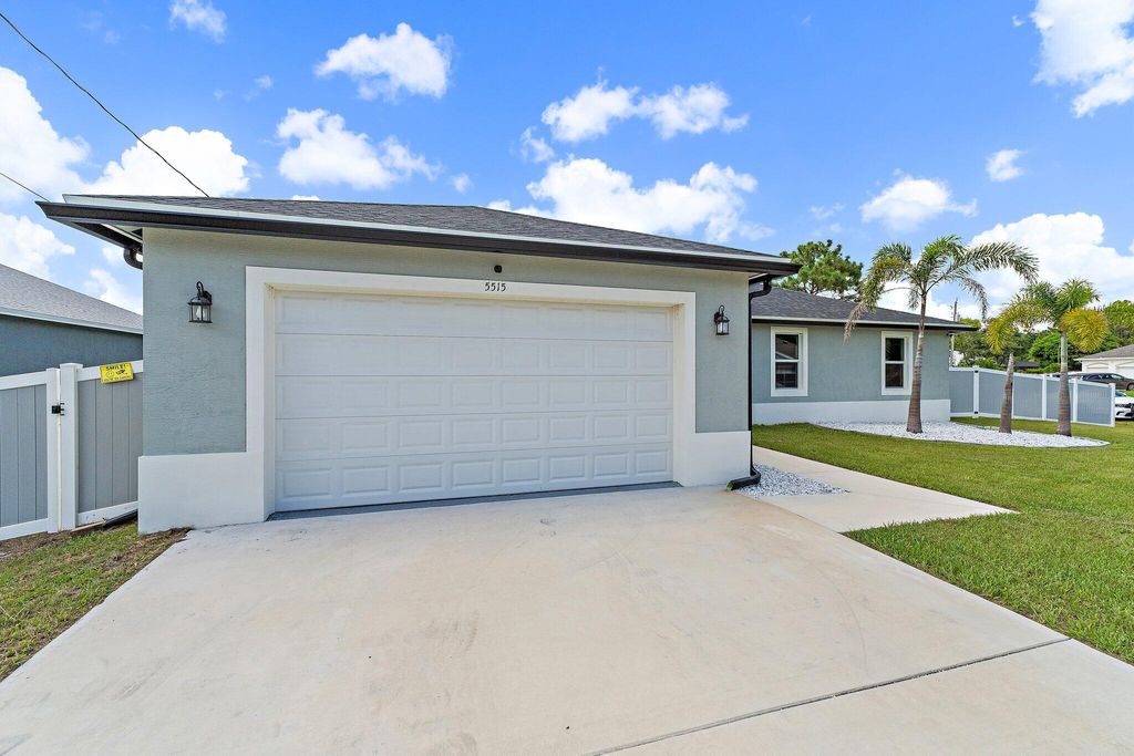 Photo of 5515 NW Downs Street, Port Saint Lucie, FL 34986 (MLS # R11125367)