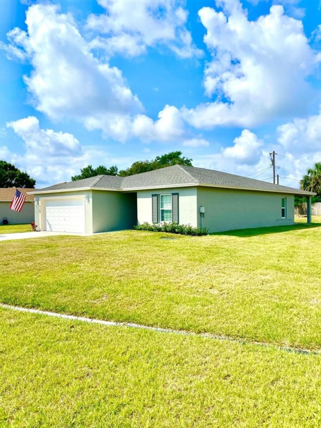 Photo of 718 NE Perch Lane, Port Saint Lucie, FL 34983 (MLS # F10517477)