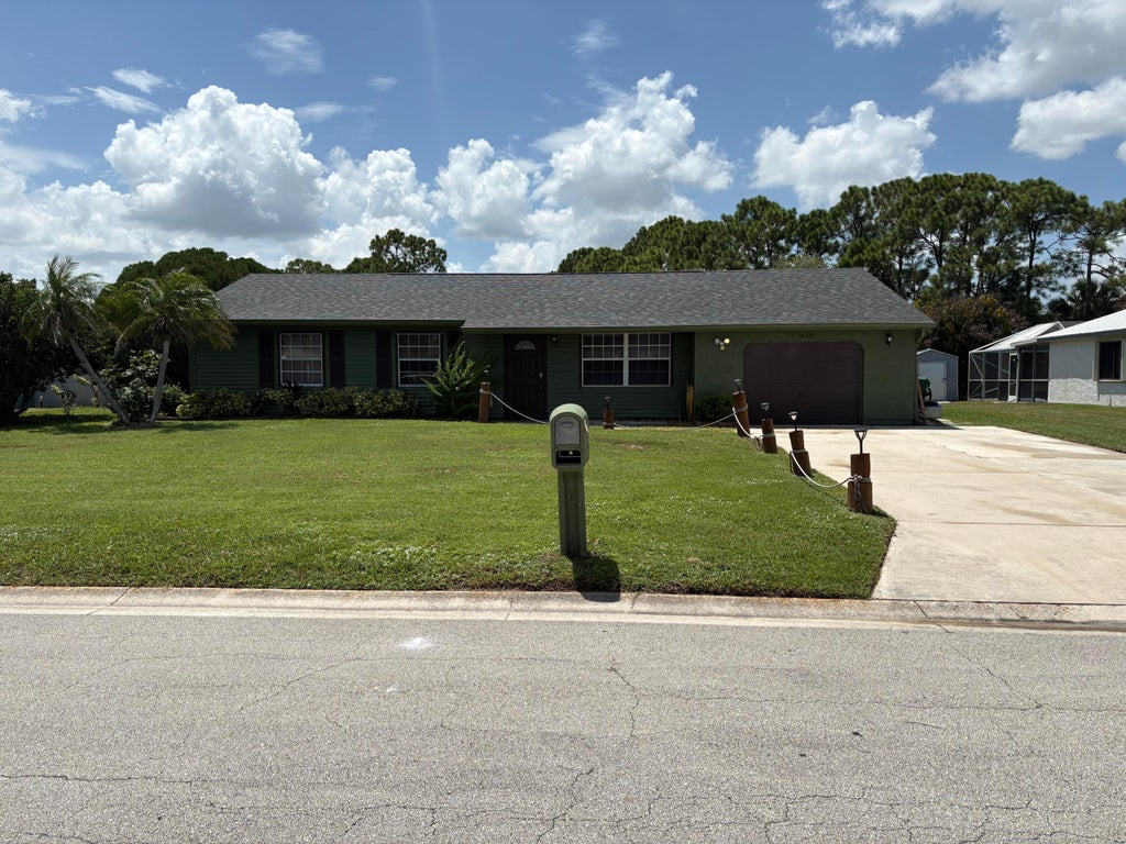 Photo of 1422 SE ARENSON Lane, Port Saint Lucie, FL 34952 (MLS # B26070087)