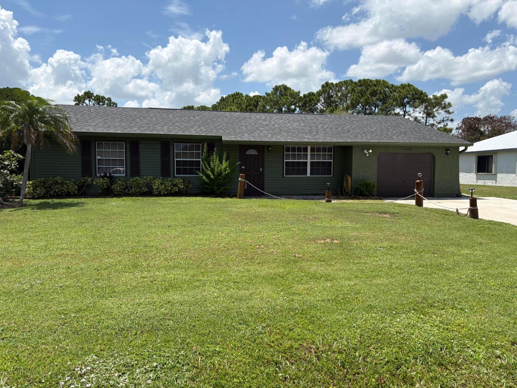 Photo of 1422 SE ARENSON Lane, Port Saint Lucie, FL 34952 (MLS # B26070087)