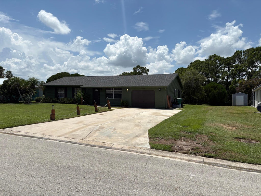 Photo of 1422 SE ARENSON Lane, Port Saint Lucie, FL 34952 (MLS # B26070087)