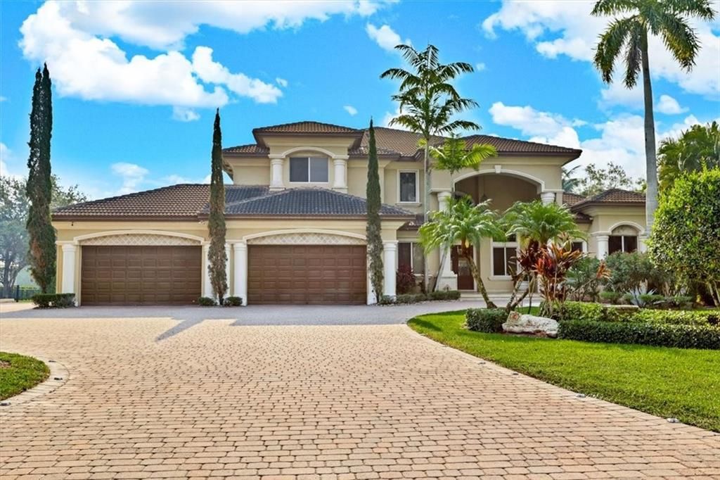 Photo of 6320 NW 71st Ter, Parkland, FL 33067 (MLS # F10330521)
