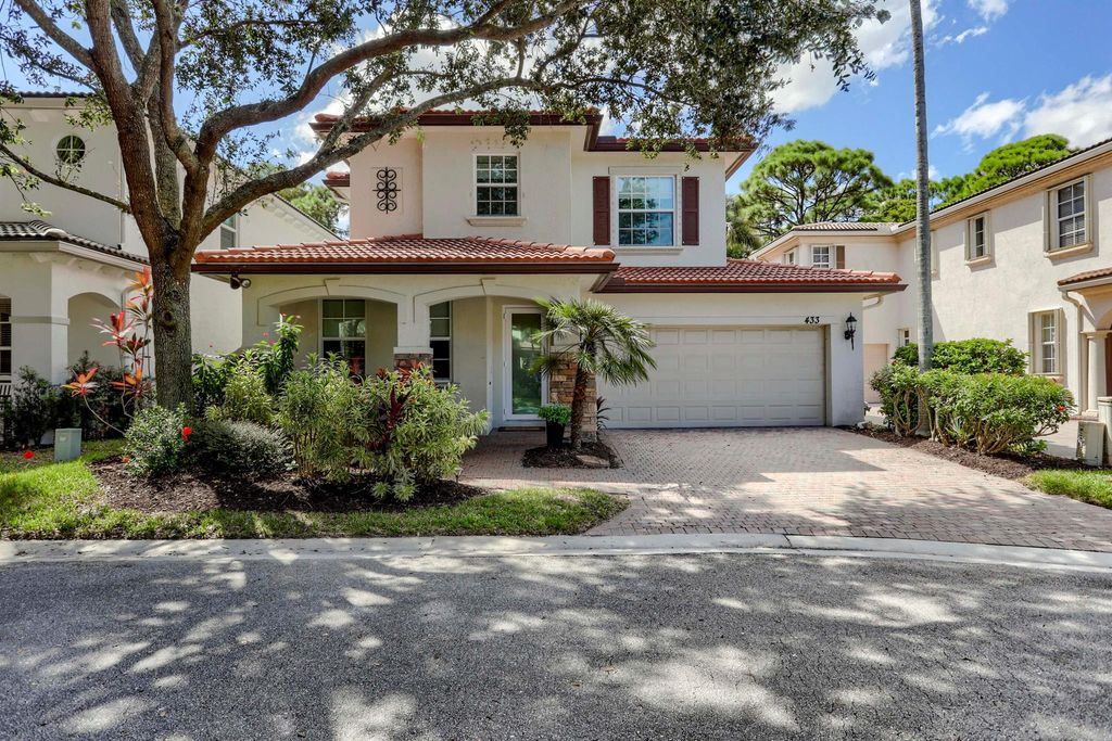 Photo of 433 Pumpkin Drive, Palm Beach Gardens, FL 33410 (MLS # R10957914)