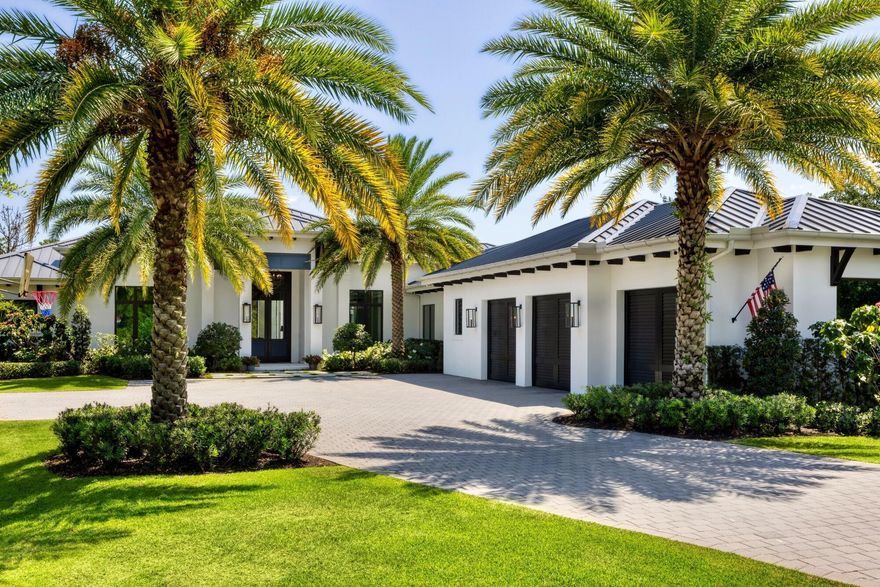 Nestled on a sprawling 1-acre lot in the gated enclave of Hidden Bridge in Jupiter, this magnificent home offers luxury, privacy, and impeccable craftsmanship. Built in 2020 by the renowned Willoughby Construction, no detail was overlooked in creating this exceptional residence. Spanning over 5,000 square feet of refined living space, this home features four spacious bedrooms, each with its own en-suite bathroom, ensuring comfort and privacy for family and guests alike. Additionally, the property includes two elegant half baths, a dedicated office for remote work or quiet study, and a three-car garage designed for both convenience and style. The heart of the home is a stunning open concept living area, where natural light floods through expansive windows, highlighting high-end finishes