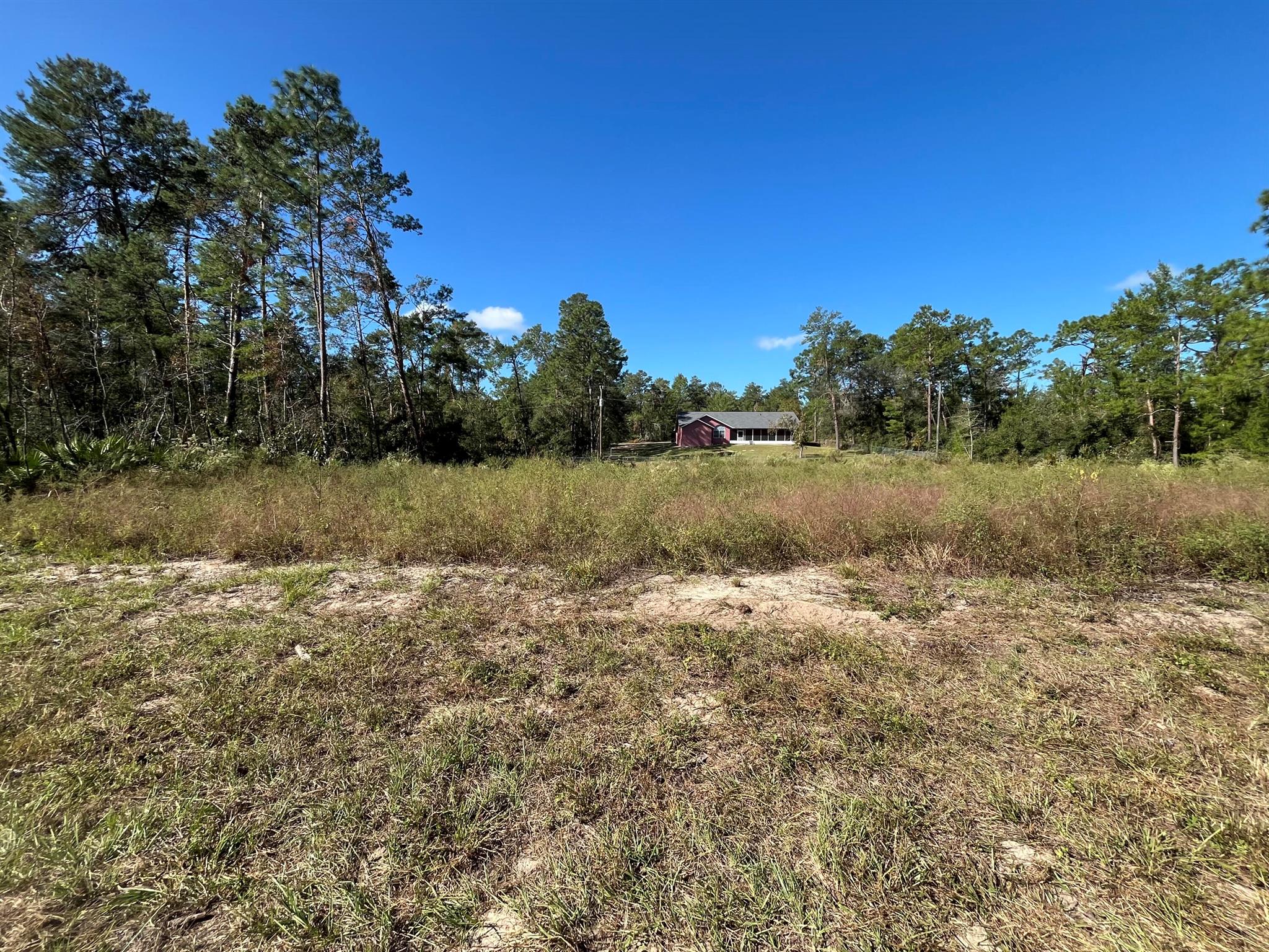 OWNER FINANCING CONSIDERED! Come check out this beautiful, oversized 0.52-acre lot that has been surveyed located in the growing community of Marion Oaks. This parcel offers plenty of potential for those looking to build their new home. There are many new builds currently in the process of construction in this area. Convenient to I75, World Equestrian Center, shopping, schools, hospitals, mall, and restaurants! Looking to purchase property in Florida, look no further. Buying Land in Florida is a solid investment for your future. FOR DIRECTIONAL PURPOSES 17364 SW 41ST CIRCLE No standard water connection extension required