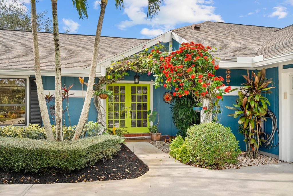 Photo of 1022 SW Tiburon Way, Palm City, FL 34990 (MLS # R11155536)