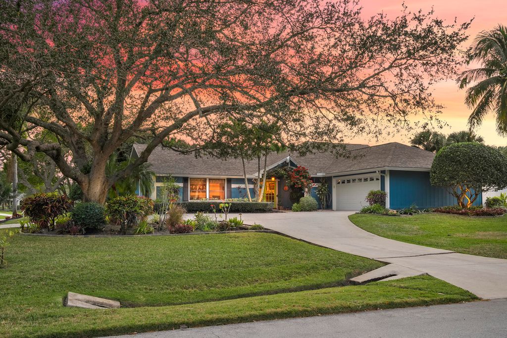 Photo of 1022 SW Tiburon Way, Palm City, FL 34990 (MLS # R11155536)