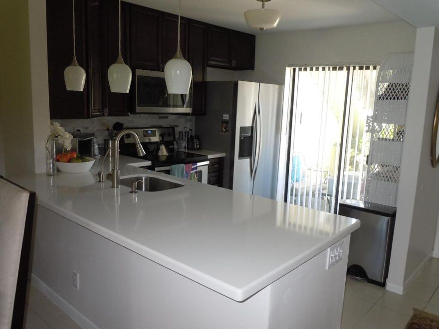 This beautiful newly renovated 2/2 condo is located in highly desirable east Delray- 5 mins to beach, 5 mins to Atlantic Ave. This unit has new appliances, new cabinets, new flooring, new granite countertops, etc.  Washer /dryer is located in patio closet- Hurricane shutters - basic cable and water included in rent.
Minimum credit score of 650 please.