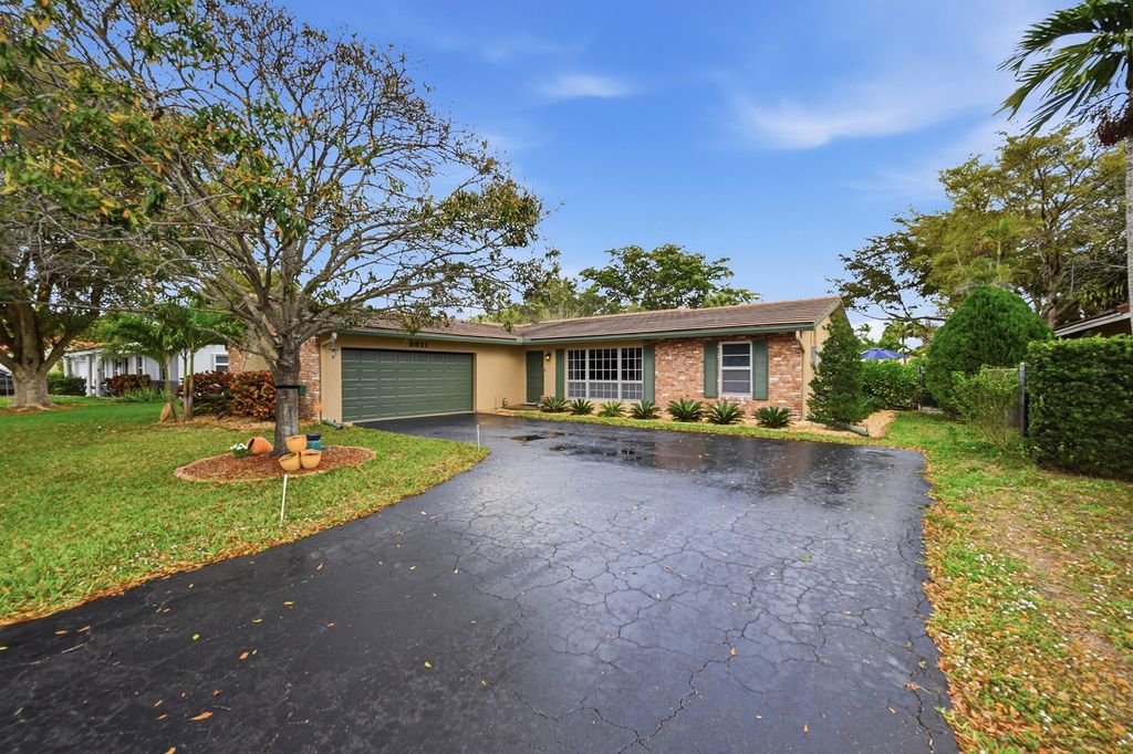 Photo of 8611 NW 29th Dr, Coral Springs, FL 33065 (MLS # B26000134)