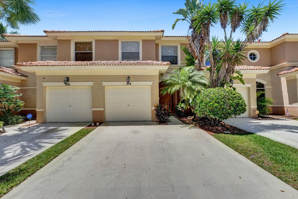 Photo of 254 RIVER BLUFF Lane, Royal Palm Beach, FL 33411 (MLS # B26079361)