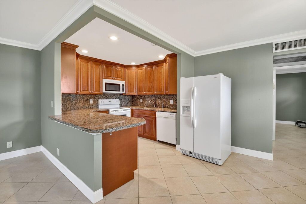 Photo of 94 Valencia D, Delray Beach, FL 33446 (MLS # R11108765)