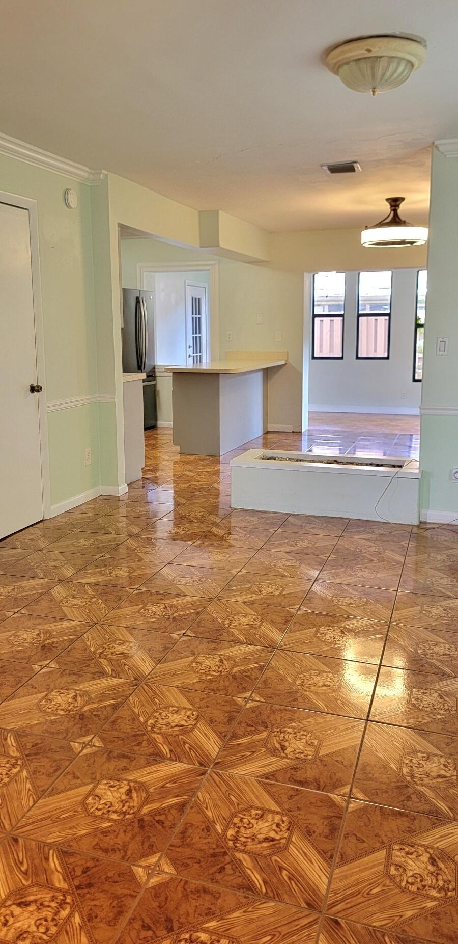 Photo of 323 Sandtree Drive, Palm Beach Gardens, FL 33403 (MLS # R11115314)