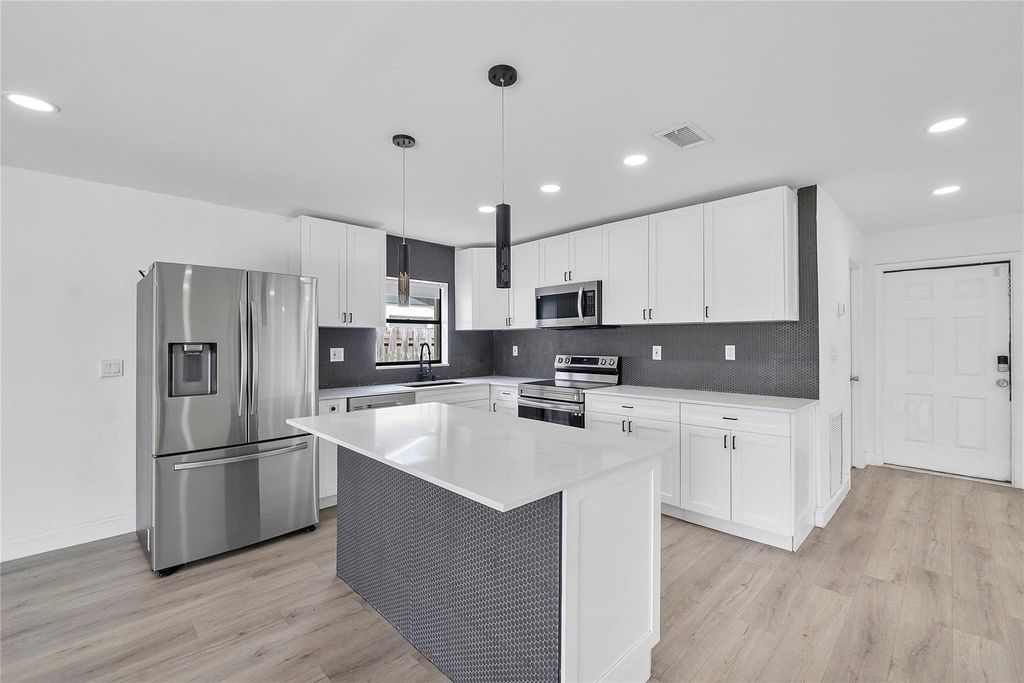 Photo of 2416 NW 98th Ln, Coral Springs, FL 33065 (MLS # F10531525)