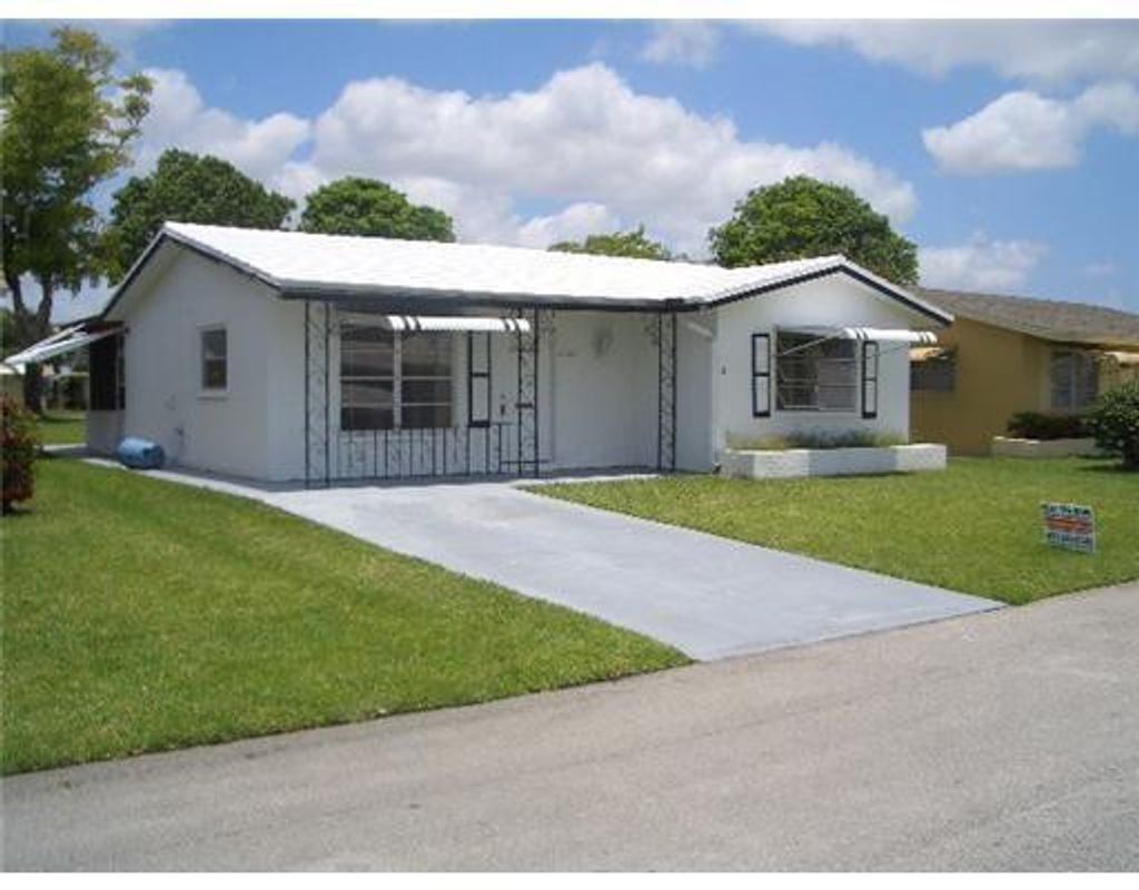 Photo of 7105 NW 57th Court, Tamarac, FL 33321 (MLS # F10550721)