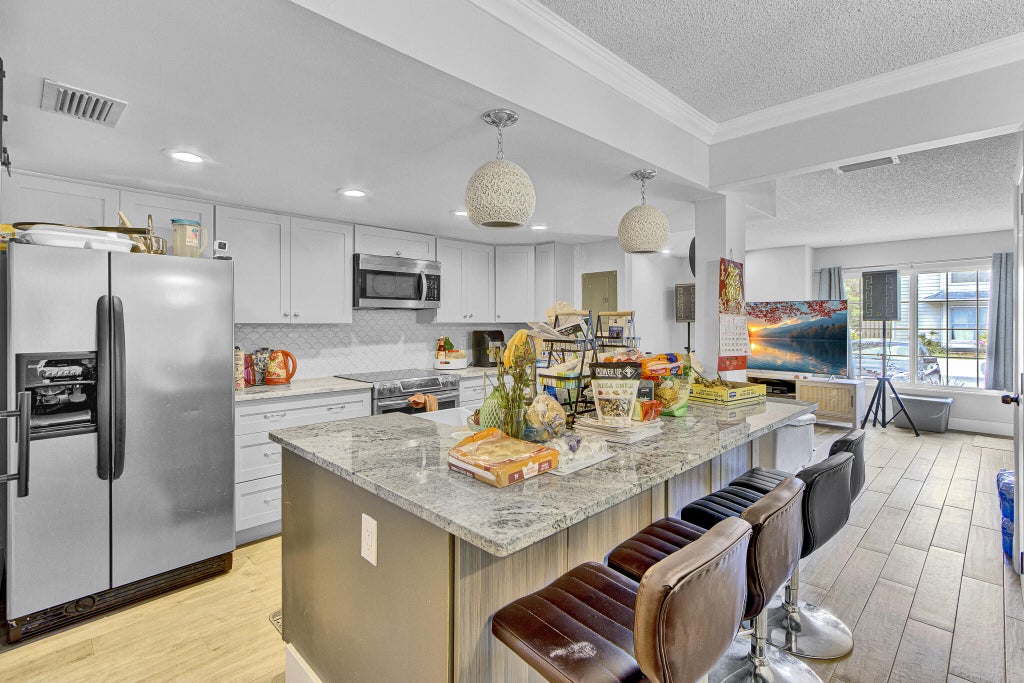 Photo of 5893 CASSANDRA Court, West Palm Beach, FL 33415 (MLS # B26058771)
