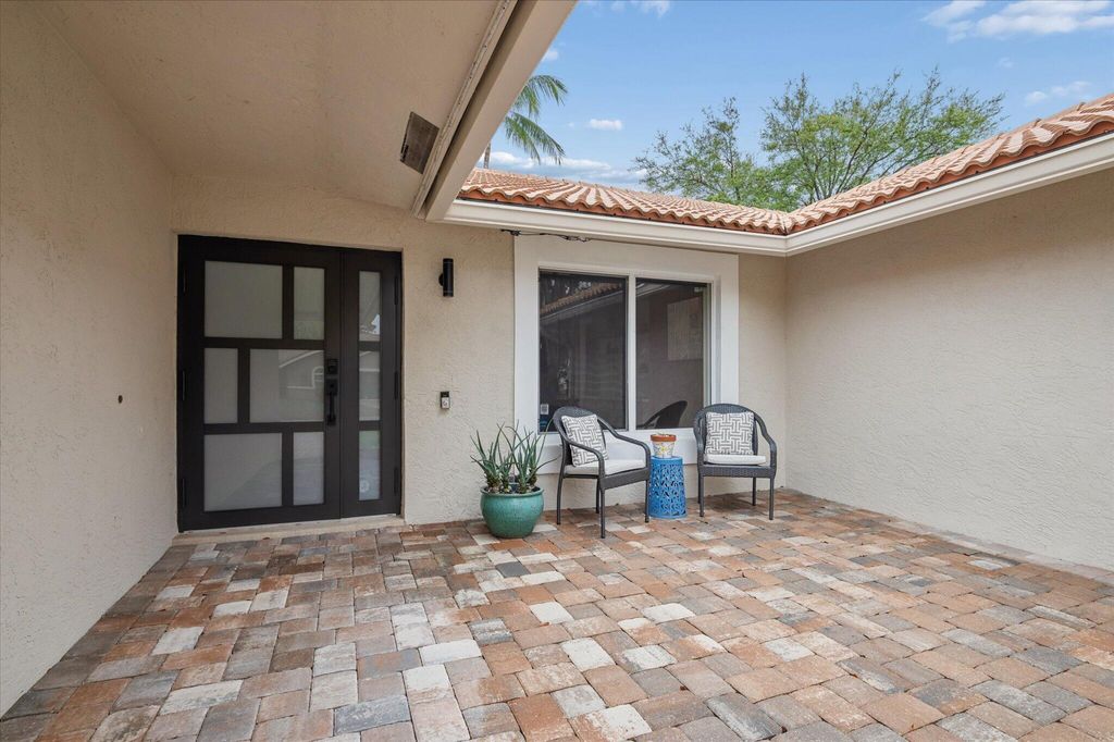 Photo of 8442 NW 47th Drive, Coral Springs, FL 33067 (MLS # B26004500)