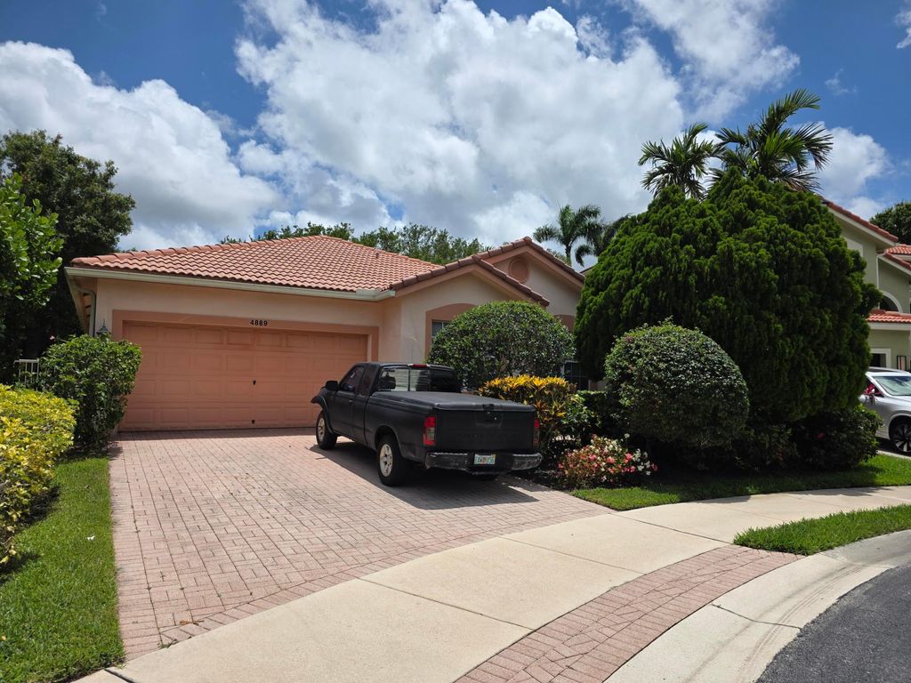 Photo of 4889 N Classical Boulevard, Delray Beach, FL 33445 (MLS # B26033971)