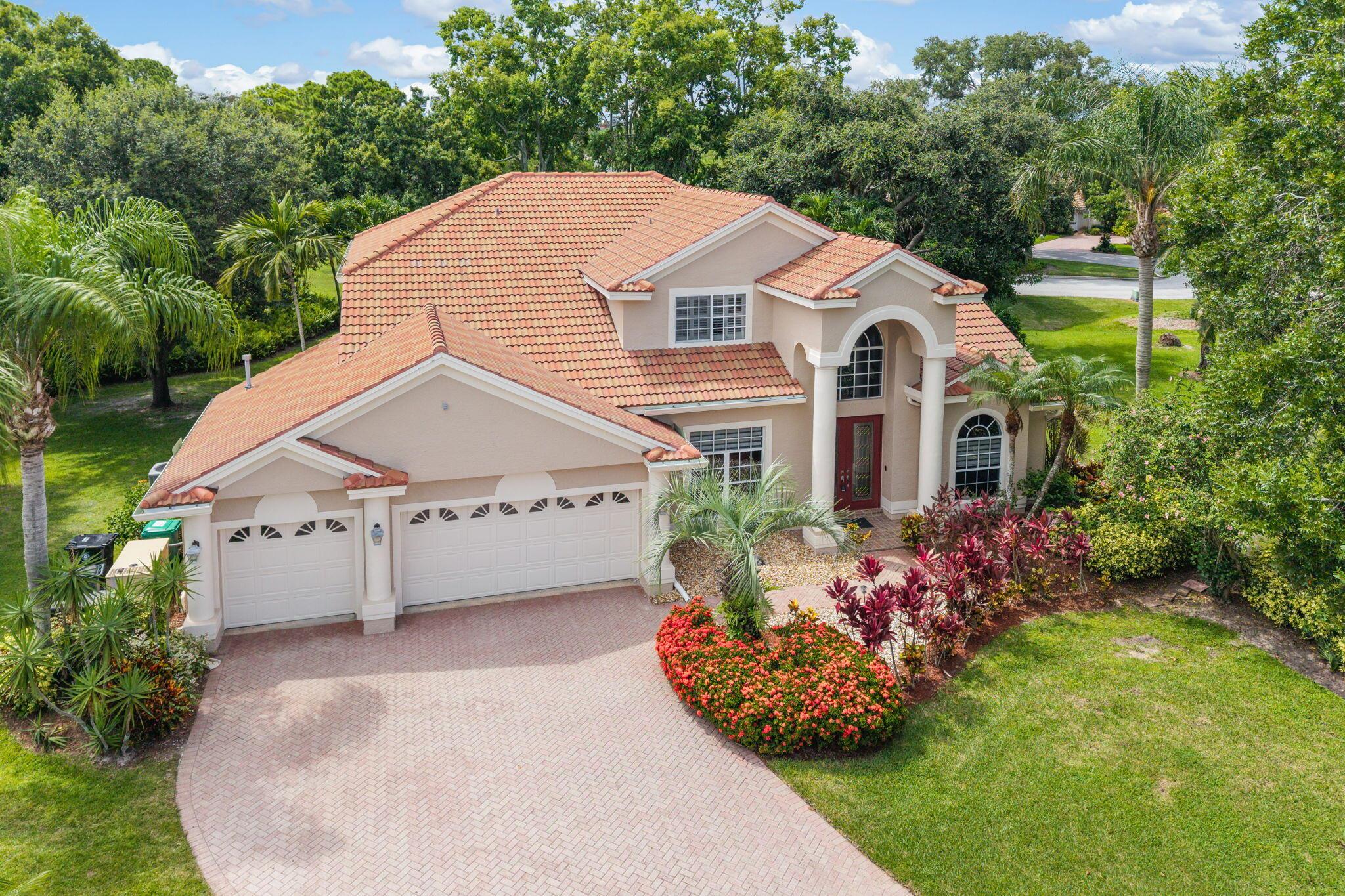 Beautiful 2 story home in the gated neighborhood of Country Club Estates of Port St. Lucie. First floor primary bedroom with the largest walk in closet-You will not be disappointed. Plus an additional walk in closet with a spacious bath that includes 2 sinks, soaking tub and walk in shower. Main living area is open with sliding doors to large screened patio with great views of oversized lot (room for pool). Patio has been piped for gas and includes gas heater for cooler winter months. Granite kitchen with custom cabinet work and stainless appliances. Formal dining room and living room and family room with great entertainment space and is wired for surround sound. Upstairs enjoy 3 more bedrooms, bath with tub and game/den room.