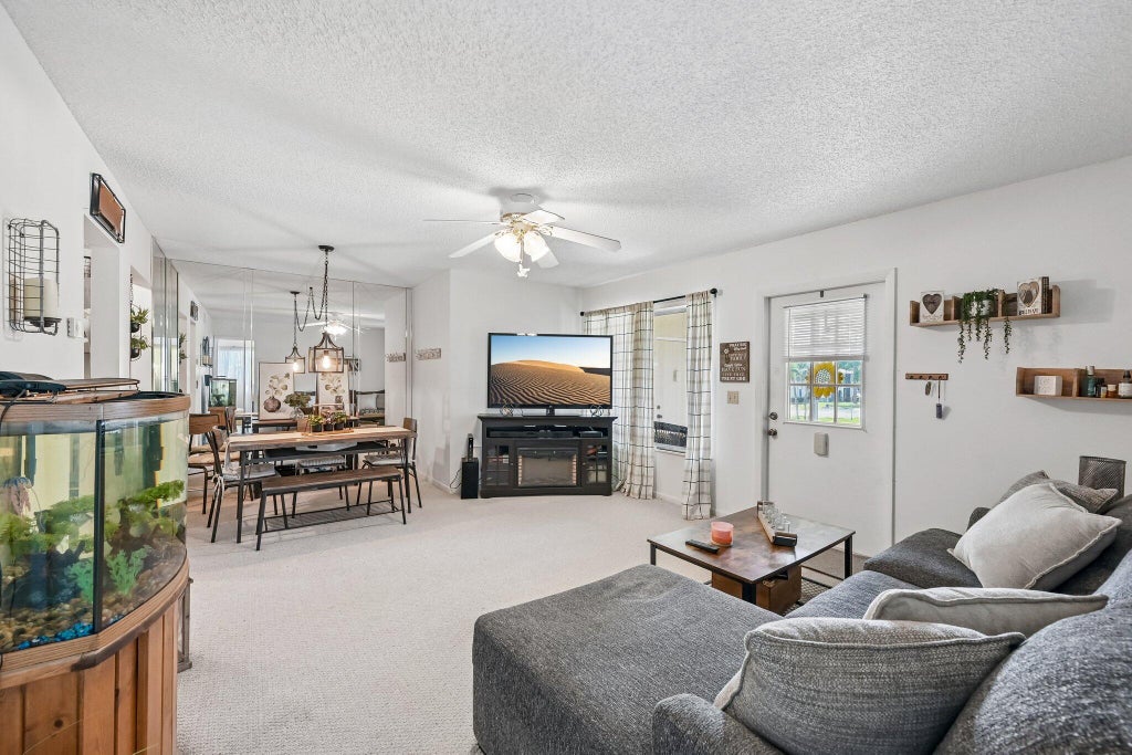 Photo of 5901 Whispering Pine Way #C-2, Greenacres, FL 33463 (MLS # B26041860)