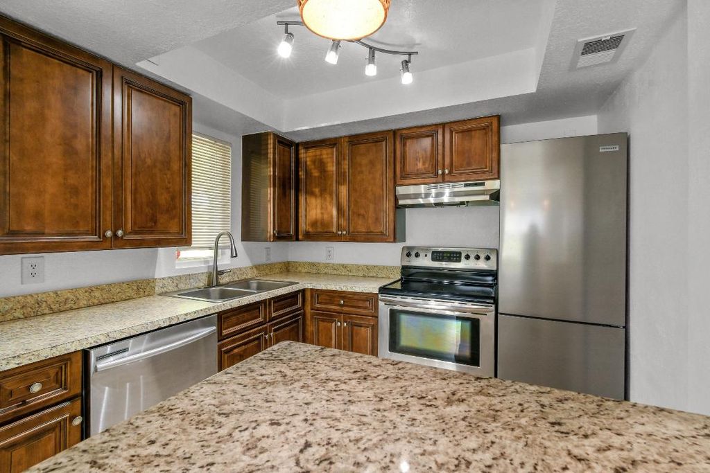 Photo of 1604 SE Green Acres Circle #T101, Port Saint Lucie, FL 34952 (MLS # R11120228)