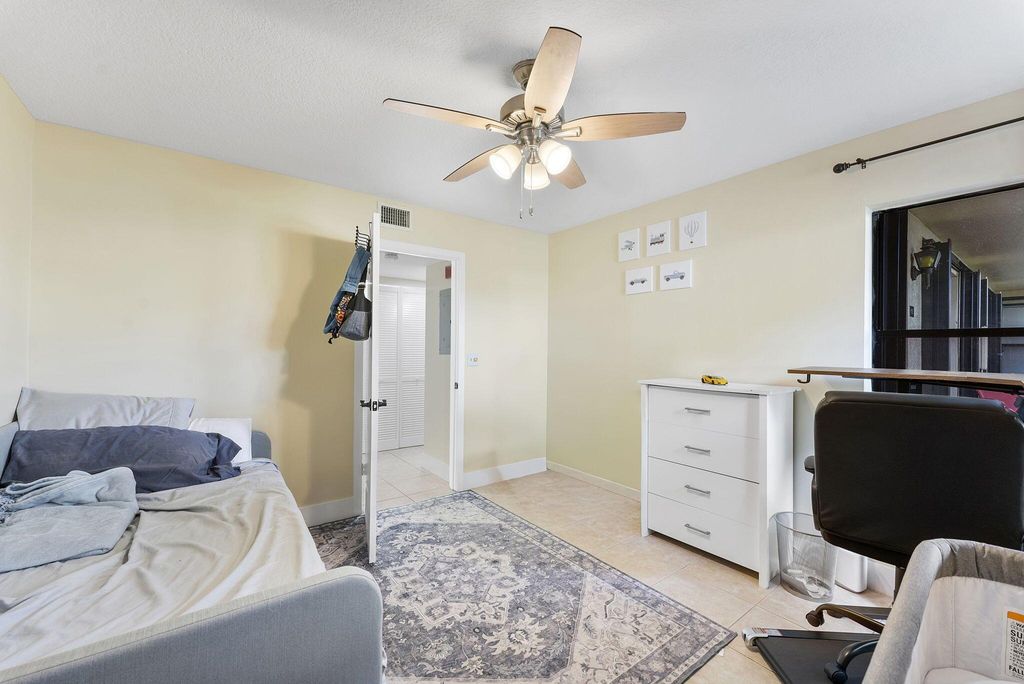 Photo of 4705 Lucerne Lakes Blvd Blvd E #103, Lake Worth, FL 33467 (MLS # R11130413)