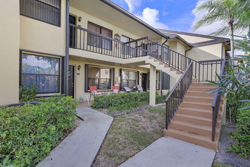 Photo of 4705 Lucerne Lakes Blvd Blvd E #103, Lake Worth, FL 33467 (MLS # R11130413)