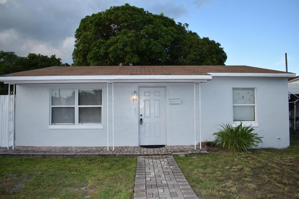 Photo of 511 Hunter Street, West Palm Beach, FL 33405 (MLS # R11132064)