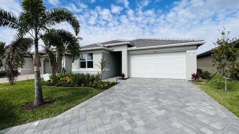 Photo of 11664 SW River Crossing Place, Port Saint Lucie, FL 34987 (MLS # B26058397)