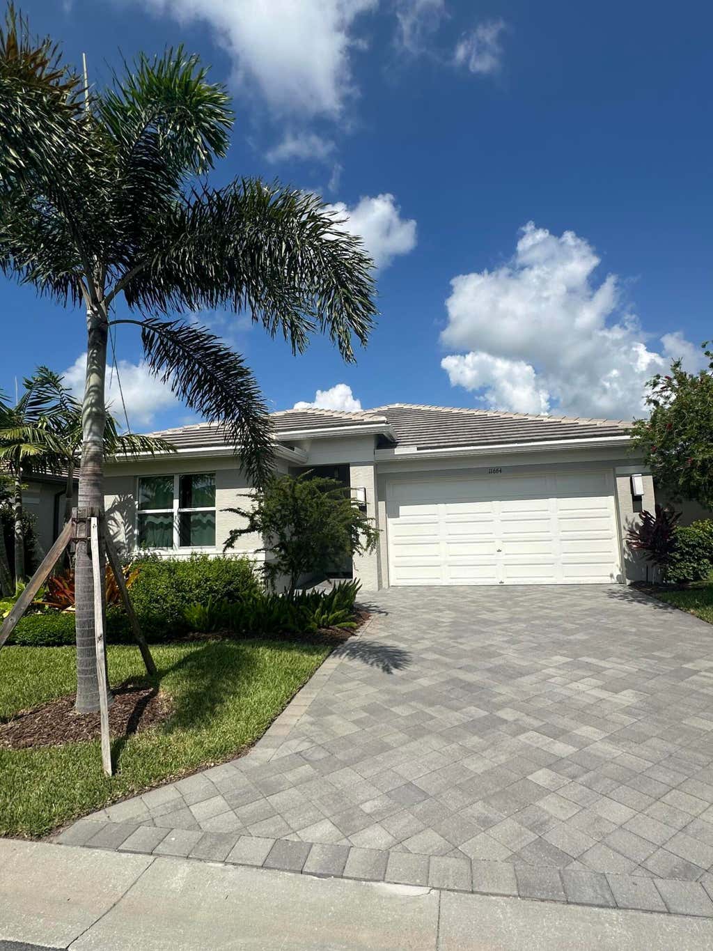 Photo of 11664 SW River Crossing Place, Port Saint Lucie, FL 34987 (MLS # B26058397)