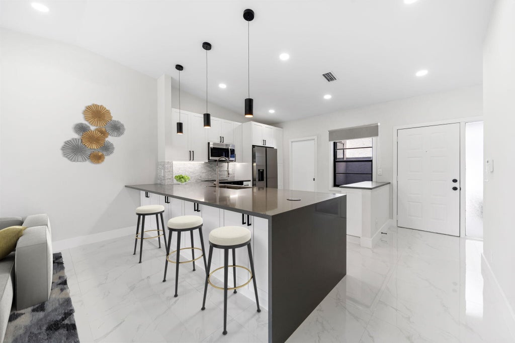 Photo of 6092 Kings Gate Circle, Delray Beach, FL 33484 (MLS # R11062979)